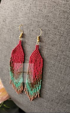 Colors: Red, Brown, Teal and Bronze Bohemian Red Beaded Earrings Gift, Red Bohemian Beads For Crafting, Artisan Red Earrings With Dangling Beads, Bohemian Red Beaded Drop Earrings, Handmade Red Beaded Long Drop Earrings, Handmade Red Beaded Earrings For Festival, Handmade Red Long Drop Beaded Earrings, Artisan Red Beaded Earrings With Dangling Beads, Artisan Red Handmade Beaded Earrings