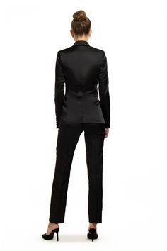 Women who wear black lead colorful lives. Black Fitted Long Sleeve Suit, Fitted Black Long Sleeve Suit, Black Fitted Tuxedo Outerwear, Fitted Black Tuxedo Outerwear, Black Long Sleeve Tuxedo Blazer, Black Single-breasted Suit For Fall, Black Suits With Lapel Collar For Fall, Black Slim Fit Outerwear With Suit Collar, Fall Tuxedo With Notch Lapel