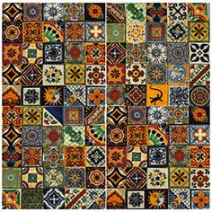 a colorful tile pattern with many different colors and designs on it's sides, including orange