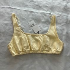 Zara Bra Top Size: Xxl Color: Yellow Brand: Zara Condition: Nwt Details: - Comfy - Can Be Worn As Bralette Or Crop Top - Perfect For Lounging Or As A Layering Piece Extras : - I Ship Same/ Next Day - Open To Reasonable Offers Zara Cropped Top For Vacation, Zara Cropped Top For Beach, Zara Cropped Top For The Beach, Casual Zara Beach Crop Top, Zara Cotton Beach Crop Top, Zara Summer Crop Top For Beach, Zara Summer Beach Crop Top, Zara Cotton Crop Top For Beach, Zara Summer Crop Top For Day Out