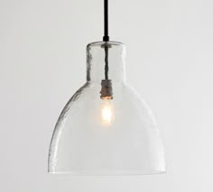 Construction Expertly crafted of steel and blown glass with a Polished Nickel, Tumbled Brass or Bronze finish. Mouth-blown Clear glass shade is included. Compatible with dimmer switch. Damp UL-listed. Light bulb(s) are not included. Accommodates one 60W Type A standard Bulb(s) or LED equivalent. Base Type: E26. Includes two 12" long poles and one 24" long pole. Imported. Care Dust with soft, dry cloth. We do not recommend using harsh household chemicals as they can damage the finish. Do not exce Remodel Kitchen, Hanging Light Fixtures, Lantern Pendant, Mirror Art