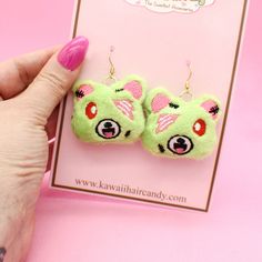 "Now you can have your very wear my super cute kawaii plushes and wear therm on all of your adventures! My kawaii plush zombie bear earrings have been embroidered on the softest minky fabric and are filled with polyester filling. They make the perfect bear lovers gift or horror movie gift. This listing is for a pair of zombie bear earrings....Other plush earrings available in my shop. Perfect for all styles! :) Use these accessories for an instant update on just about any kawaii style! ♥ Earring Hooks Gold Colored Stainless Steel Wire ♥ Measures approx. 2\" across x 1\" high ♥ Designed by & exclusive to Kawaii Hair Candy ♥ Made in the USA ♥ Intended for use by adults only We hope you wear these with every piece of clothing you own!" Harajuku Style Halloween Jewelry Gift, Handmade Green Kawaii Earrings, Plush Earrings, Zombie Bear, Plush Accessories, Bear Anime, Zombie Halloween Costumes, Kawaii Hair, Anime Earrings