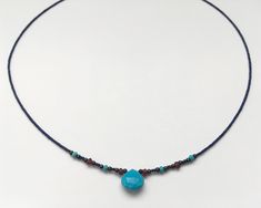 This is a very fine delicate semi precious necklace made with Turquoise teardrop stone, Lapis lazuli beads and touch of faceted 3mm Garnet, oxidised silver and Turquoise beads. Turquoise teardrop is 10x10mm size. Please take a look at all the photos and ask any questions you might have. The necklace is short but not quite a choker - it sits just under the collar bones. The full measurement from clasp to end is 44cm or 17.5 inches. All the jewellery comes in Heiter branded boxes. I ship all my items using recorded delivery with tracking number. Thank you! Turquoise Briolette Gemstone Bead Necklaces, Adjustable Teardrop Turquoise Necklace With Natural Stones, Blue Turquoise Teardrop Necklace With Gemstone Beads, Gift Beaded Teardrop Turquoise Necklace, Gift Turquoise Beaded Teardrop Necklace, Gift Teardrop Beaded Turquoise Necklace, Blue Teardrop Gemstone Beaded Necklaces, Blue Teardrop Gemstone Beads Necklace, Gift Turquoise Teardrop Beaded Necklace