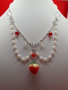 A strawberry necklace that is perfect for your outfit 🍓 🤍 This item is handmade by me - Please refrain from tugging on the items, be gentle! It may cause breakage for this is handmade. Handle with care! - This item is not waterproof, rusting may occur when wet 🤍About my store - Make sure your address and payment information is valid before purchase. - Once I ship a package it is not in my hands anymore. If something were to happen to your package (ex. lost, or stolen) that is on the shipping Strawberry Jewelry Diy, Strawberry Seed Bead Necklace, Dopamine Jewelry, Strawberry Beaded Necklace, Strawberry Shortcake Necklace, Strawberry Pearl Necklace, Strawberry Jewelry, Pink Heart Necklace, Strawberry Necklace