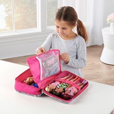 Our Badger Basket travel case is the perfect on-the-go accessory to keep your 12-inch fashion doll collection safe and secure. A double-sided hard shell design helps to protect your fashion dolls while you are out and about. Both sides feature a hook and loop strap that can be used to hold up to six dolls in place, secured so there's no chance of them moving around during travel. The case features an additional flap with two mesh pockets that are perfect for packing doll clothing or other access Barbie Suitcase, Doll Clothes Storage Suitcase, Barbie Storage, Barbie Carrying Case, Barbie Travel Case, Barbie Doll Case, American Girl Doll Trunk, Barbie Doll Carrying Case, Doll Storage