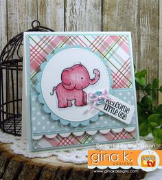 a card with an elephant on it sitting next to a birdcage and plant