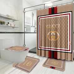 the bathroom is decorated in brown and red tones with gold accents on the shower curtain