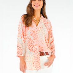 Coral, Pink, And Earth Tones Come Together On An Off-White Ground To Create The Go-To Blouse, A Tunic-Length Blouse With A Swing Shape. It Has A Classic Button-Down Design With A V-Neckline And Collar. Cheeky Skin Oversized Shape, Three-Quarter Raglan Sleeves With Partial Elastic Cuffs Summer Split Neck Pink Blouse, Feminine Split Neck Blouse, Chic Split Neck Blouse For Vacation, Feminine Summer Blouse With Split Neck, Feminine Spring Tops With Split Neck, Summer Feminine Split Neck Blouse, Feminine Split Neck Tops For Spring, Versatile Spring Vacation Blouse, Versatile Spring Blouse For Vacation