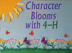 a sign that says character blooms with 4 - h in front of flowers and butterflies