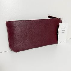 Sold Out Online Senreve Bracelet Pouch Mimosa Genuine Leather (Scratch And Water Resistant) Color Is Bordeaux (Burgundy, Maroon, Merlot, Deep Red) Stain-Resistant Micro-Suede Interior Made In Italy An Elegant Wristlet By Night And A Removable Pouch By Day. The Removable Wristlet Strap Transforms Into A Leather Bracelet. **Leather Bracelet Is Not Pictured, But Is Included. It Is Wrapped In Original Tissue From Senreve And Placed Inside Of The Pouch Dimensions Width: 10.25" Or 26 Cm Height: 4.75" Elegant Burgundy Clutch For Travel, Elegant Red Everyday Clutch, Elegant Red Travel Pouch, Burgundy Shoulder Bag With Removable Pouch, Leather Burgundy Bags With Removable Pouch, Burgundy Leather Shoulder Bag With Removable Pouch, Red Everyday Pouch Wallet, Burgundy Bag With Removable Pouch For On-the-go, Envelope Sleeve