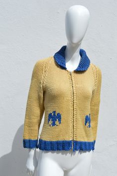 "In AS IS condition, some wear, stain, is a vintage used look Old hand knitted sweater from the 40-50's looks like a kids sweater, will fit a woman size 2-6 but it will be short on the sleeve the zipper is fine but DO NOT unzipped oi all the way and open the sweater as is very Hard to get it back on hand Knitted Measures 14-15\" across the shoulders (no shoulder seam) stretches 17-19\" across the chest from pit to pit 16-19\" across the waist 22\" long 21\" long sleeves" Fitted Retro Knit Sweater, Retro Fitted Knit Sweater, Vintage Fitted Knit Sweater, Vintage Fitted Knitted Sweater, Handmade Vintage Cardigan For Winter, Fitted Vintage Knitted Sweater, Vintage Hand-knitted Sweater, Hand Knitted Vintage Knit Sweater, Vintage Fitted Hand Knitted Sweater