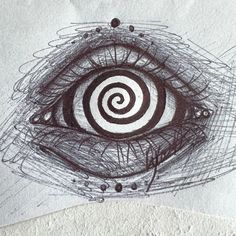 a drawing of an eye with spirals on it