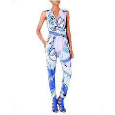 Emilio Pucci pairs a vivid print and jumpsuit silhouette with relaxed confidence, perfect for the self-assured woman on holiday. Printed jersey; V-neck; sleeveless; Crossover front; Yoked, gather back; Gathered waistband; Dropped-rise pants; Side slash pockets; Slim cropped legs; 100% ViscosaMade in Italy Pucci Print, One Shoulder Cocktail Dress, Velvet Trousers, Jumpsuit Online, Printed Jumpsuit, Emilio Pucci, Embroidered Dress, Crossover, Neiman Marcus