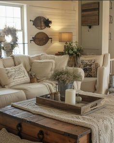 a living room filled with furniture and decor