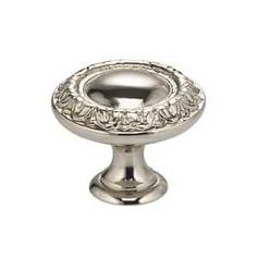 an antique style knob in polished silver