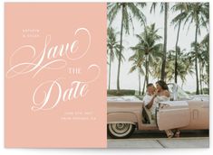 the save the date photo card is shown in pink and features an image of a couple kissing