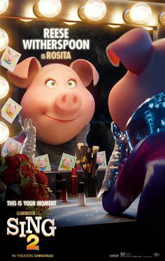 the movie poster for sing 2 is shown in front of a mirror with lights on it