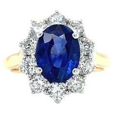 an oval blue sapphire and diamond ring