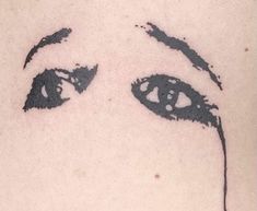 a woman's face with eyes drawn on her chest and behind it is a black ink drawing