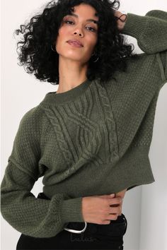 If you're feeling snuggly and looking stylish, the culprit must be the Lulus Cozy Cause Heather Olive Cable Knit Sweater! Medium gauge knit, with an allover heathered effect for a vintage-cool influence, shapes a round neckline and a boxy bodice with cable knit details throughout. Seamed drop shoulders accent the long ballon sleeves. Ribbed knit detailing at the neckline, fitted cuffs, and a slightly cropped hem. Fit: This garment fits true to size. Length: Size medium measures 21" from shoulder Olive Green Sweater, Lulu Fashion, Cable Knit Sweater, Knitted Pullover Sweaters, Green Sweater, Retro Outfits, Cropped Sweater, Knitted Pullover, Cable Knit