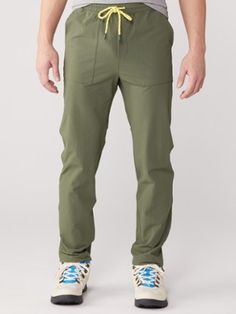 Lightweight and movement-friendly  the Cotopaxi Subo men's pants are constructed from a sun-protective  water-resistant fabric to help you climb higher no matter your pursuit. Functional Hiking Bottoms In Recycled Polyester, Functional Recycled Polyester Hiking Bottoms, Sporty Midweight Cargo Pants For Outdoor Work, Sporty Green Parachute Pants For Hiking, Relaxed Fit Moisture-wicking Pants For Outdoor Activities, Relaxed Fit Go-dry Bottoms For Hiking, Functional Stretchable Pants For Hiking, Outdoor Pants With Pockets In Recycled Polyester, Functional Midweight Cargo Pants With Elastic Waistband