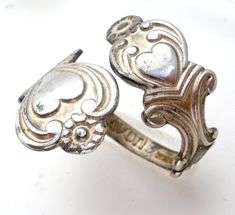 Vintage Jewelry - This is a 1975 sterling silver bypass "Treasured Heart" spoon ring. It is signed Avon, hallmarked Sterling Spain, almost 1" wide, size 8.5, slightly adjustable, weighs 4.8 grams, some tarnish. Heart Spoon, Avon Rings, Avon Makeup, Spoon Ring, Avon Jewelry, Spoon Rings, Vintage Avon, Style Guides, Vintage Jewelry