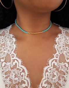 Turquoise Seed Choker - Turquoise Beaded Choker - Gold Beaded Choker - Dainty Gold Choker - Gold Seed Choker - Seed Bead Choker - Seed Necklace - Boho Seed Choker * D E T A I L S * This choker is made with size 8 Seed Beads that are strung onto durable Stretch Cord and is finished with a Lobster clasp.  * S I Z E * This choker is avaliable in the following sizes: 11 inches 11.5 inches  12 inches  12.5 inches 13 inches  13.5 inches  14 inches  Each choker comes with a 2" extension chain.  * Q U E Turquoise Tiny Beads For Jewelry Making, Adjustable Turquoise Necklaces With Gold Beads, Adjustable Turquoise Necklace With Gold Beads, Beaded Turquoise Necklace With Round Beads, Adjustable Turquoise Beaded Necklaces, Adjustable Turquoise Beaded Necklace, Turquoise Necklace With Spacer Beads For Beach, Bohemian Beaded Turquoise Choker, Bohemian Turquoise Beaded Choker