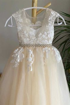 Elegant champagne tulle flower girl dress features with lace appliques, beads and belt. ♡ Fabric: Tulle ♡ Shown Color: Champagne ♡ Time: Processing Time + Shipping Time Processing Time: 12-15 days; Shipping Time: 3-5 days. ♡ If you need this product urgently, or have any questions,please contact our customer service through our live chat or email: contact@modcody.com ♡ Our dresses run true to size. ♡ Besides size 2-14, we still offer free custom size, which requires next size:Bust:___ inch/cmWai Champagne Flower Girl Dress, Champagne Flower Girl, Flower Girl Dresses Champagne, Dress With Pearls, Champagne Flowers, Tulle Flower Girl Dress, Teen Dress, Tulle Flower Girl, Tulle Flowers