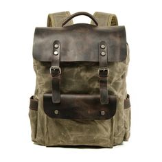 This travel backpack for men is made from premium-class 100% authentic leather with a soft handle and softback design making it comfortable to carry. It is waterproof and safe for traveling that may involve outdoor activities. It is also wear-resistant, which is suitable for hiking. It has an arcuate shoulder strap and an interior compartment. It also has a sturdy, durable external frame that has undergone the latest embossing technique.  Product highlights:   Perfect match with your travel wardrobe  Highly affordable premium quality bag  With an adjustable and soft shoulder strap  Available colors: green, khaki, gray  Bag dimensions: 30cm * 11cm * 45cm   Utilizing waxed canvas, this backpack is now enhanced with a waterproof feature, making it an ideal choice for outdoor travel in any wea Canvas Backpack Pattern, Waxed Canvas Leather Backpack, Cool Backpacks For Men, Waxed Canvas Backpack, Waterproof Laptop Backpack, Canvas Backpacks, Waxed Canvas Bag, Backpacks Travel, Mens Backpack Travel