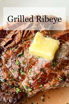 tender and juicy grilled ribeye with butter on top