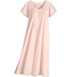 You'll drift back to a gentler time every night you put on this charming 100% cotton nightgown. It's generously cut for comfort and finished with thoughtful details like pintucking on the bodice, floral appliqués, and lace trim along the neckline and short sleeves. It's the simple things that make each day a treasure.Summer-weight cotton for hot nights and warm sleepersTrimmed in beautiful laceSide-seam pockets and side slits at the hemApprox. 50" longAvailable Women's Plus sizesMachine wash and Feminine Lace Trim Nightgown For Sleepovers, Cotton Sleepwear With Lace Trim For Bedtime, Feminine Cotton Sleepover Dress, Feminine Cotton Dress For Sleepover, Feminine Cotton Sleep Dress, Pink Cotton Nightgown With Lace Trim, Cotton Loungewear Dresses With Lace Trim, Cotton Dresses With Lace Trim For Loungewear, Cotton Nightgown With Lace Trim For Sleep