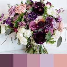 a bouquet of purple and white flowers with greenery on the bottom, in front of a color palette