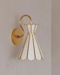 a wall light that is on the side of a wall