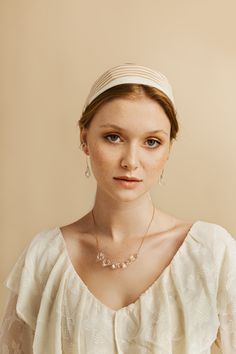 Discover the captivating beauty of the Lumea Necklace. This exquisite piece of jewelry is meticulously handcrafted to showcase the allure of glass art. The necklace features a stunning clear glass pendant, reminiscent of glistening ocean waves, suspended from a delicate chain. The Lumea collection is inspired by the elements of water, evoking a sense of tranquility and elegance. Each necklace is carefully crafted with attention to detail, making it a unique and cherished accessory. This necklace is a perfect blend of sophistication and versatility. It effortlessly complements both casual and formal outfits, adding a touch of refinement to your style. Whether worn for everyday occasions or special events, the Lumea ClearNecklace is sure to attract attention and become a conversation starter Handmade Elegant Drop Crystal Necklaces, Elegant Adjustable Crystal Teardrop Pendant Necklace, Elegant Adjustable Teardrop Pendant Crystal Necklace, Elegant Adjustable Teardrop Beaded Necklaces, Elegant Adjustable Teardrop Crystal Necklace, Elegant Beaded Teardrop Pendant Necklace For Gift, Elegant Teardrop Pendant Beaded Necklace As Gift, Elegant Clear Teardrop Pendant Necklace, Wire Wrapped Briolette Jewelry For Wedding