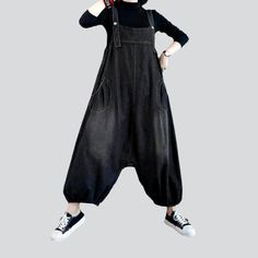 Be the talk of the town with our 2023 Spring Collection Women's Baggy Jean Jumpsuit street vibe for the trendy trendsetter.Why You'll Love It: Sanded for Style and Comfort: Crafted from premium denim with a medium wash. this jumpsuit features a sanded texture for a unique look and feel. Suspenders Closure: Keeping the baggy look intact. the suspenders closure ensures a snug and secure silhouette. Modern Street Style: With a casual silhouette and a touch of modern flair. this jumpsuit is perfect Casual Black Cotton Denim Jumpsuit, Casual Washed Black Overalls For Spring, Black Cotton Casual Denim Jumpsuit, Black Casual Overalls, Casual Cotton Denim Jumpsuit For Fall, Casual Solid Denim Jumpsuit For Spring, Black High Waist Casual Denim Jumpsuit, Trendy Black Denim Jumpsuits And Rompers, Trendy Solid Color Denim Jumpsuit For Summer