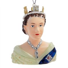 an ornament shaped like a queen wearing a tiara