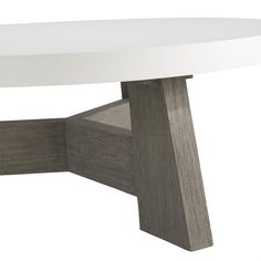 a white and grey table with wooden legs