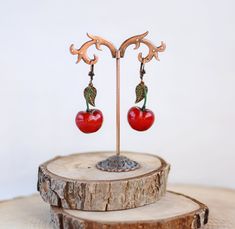 "Cherry errings, Funny red summer jewelry, Fruit boho earrings Lenght 2\" (5cm) Please, keep the jewellery away from perfume and other alcohol containing fluids because the alcohol damages the Polymer clay. Store the fragile items in separate boxes and treat them with care. Misuse may result in damage. Visit my shop https://www.etsy.com/shop/JewelryByCompliment?ref=l2-shopheader-name If you have any questions, please contact me! Thank you for your visit!" Cherry Colored Drop Earrings With Ear Wire, Cherry Dangle Earrings With Ear Wire, Cherry Drop Earrings With Ear Wire, Red Cherry Print Jewelry For Gifts, Nickel Free Cherry Colored Earrings For Gift, Nickel Free Cherry Earrings For Gift, Nickel-free Cherry Colored Earrings For Gift, Summer Gift Cherry Earrings, Red Vintage Jewelry For Summer