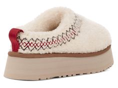 UGG: Tazz Braid in Natural * 10mm curly sheepskin upper* UGG® Tasman braid embroidery, Rear pull tab, Sheepskin collar* 10mm UGGplush™ 60% upcycled wool, 40% lyocell vamp lining* 10mm UGGplush 60% upcycled wool, 40% lyocell sockliner* EVA midsole* SugarSole™ EVA outsole* 1.75" platform height* Woven label with UGG® logo on insole* RN 88276* This product contains real fur from sheep or lamb. Fur may be sourced from Australia, Ireland, the United Kingdom, or the United States. It has been artifici Tazz Ugg, Tazz Slipper, Ugg Tazz, Harrods London, Shearling Slippers, Ugg Tasman, Limited Edition Sneakers, Sheepskin Slippers, Casual Preppy Outfits