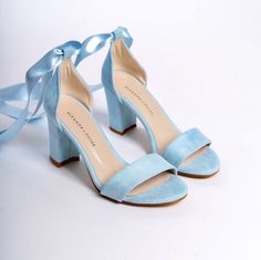 As Eleanor Louise, we stand out with our Baby Blue heeled shoes that combine style and comfort. Specifically designed for brides, these shoes are crafted with high-quality materials.

• Made from Blue Suede and Premium Vegan Leather, our shoes are equipped with an ankle strap that provides comfort throughout the day.

• Completing your style and boosting your confidence is the most elegant way! Blue Suede 3.15-inch (8 cm) high-heeled shoes offer elegance and chicness with every step. Whether it's for daily wear or a special event, these shoes not only add height but also provide a sophisticated touch to your style. Light Blue Heels Aesthetic, Baby Blue Shoes, Light Blue Heels, Graduation Shoes, Blue Block Heels, Blue Bridal Shoes, Wedding High Heels, Heels Aesthetic, Blue Wedding Shoes