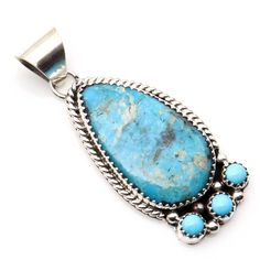 Be captivated by the beauty and craftsmanship of this turquoise pendant by Navaho artist Roy Yazzie (Hallmark RY). Adorned with a single stunning setting and 3 turquoise cabs at the bottom, this 1 3/4" long pendant (weighing 7.8 grams) is the perfect addition to any 6mm chain or necklace. Let this piece inspire your sense of style and showcase your appreciation for unique, handcrafted jewelry. Collectible Teardrop Turquoise Jewelry, Collectible Blue Turquoise Gemstone Necklace, Turquoise Pendant Necklace With Inlay, Unique Handcrafted Jewelry, Long Pendant, Turquoise Pendant, American Jewelry, Native American Jewelry, Tear Drop