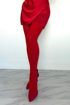 Experience the luxurious feel of our buttery soft red tights – where comfort meets a daring splash of color for a standout look.   Red Tights Opaque Buttery Soft Size: One Size Height: 5'-5'10 Weight: 100-175lbs Material: 86% Nylon, 14% Elastane Red Knee-high Winter Legwear, Red Thigh High Legwear For Winter, Trendy Red Hosiery For Winter, Thigh-high Compression Bottoms For Night Out, Trendy Red Full-length Leggings, Trendy Full Length Red Leggings, Trendy Red Thigh-high Stockings, Red Stretch Legwear For Fall, Trendy Solid Color Thigh High Legwear