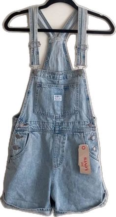 Blue Utility Shortalls For Spring, Levi's Denim Jumpsuit With Pockets For Summer, Light Wash Overalls With Pockets, Levi's Summer Jumpsuits And Rompers With Pockets, Blue Utility Overalls For Spring, Levi's Denim Overall Jumpsuit, Levi's Denim Jumpsuit With Pockets, Casual Fitted Levi's Jumpsuits And Rompers, Levi's Casual Fitted Jumpsuits And Rompers