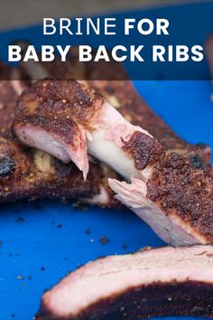 baby back ribs on a blue plate with the words brine for baby back ribs