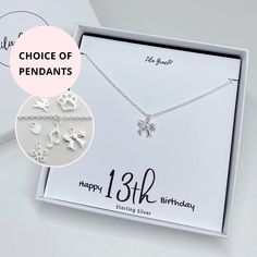 Perfect gift for a happy 13th birthday gift. Sterling silver necklace with your choice chain length and pendant, choose from the music note, paw print, rabbit, mini heart, flower, rabbit or bow. It comes in a luxury white jewellery box, the necklace will be attached to the card, this slots inside a resealable clear bag and then fits perfectly in the jewellery box.  Option to personalise the jewellery card to add a name to the top of the card, add more wording to the bottom and change the age to Silver Necklace With Gift Box For Birthday, Silver Necklace For Birthday, Silver Charm Necklace For Birthday And Mother's Day, Silver Charm Necklace For Mother's Day Birthday Gift, Birthday Gift Necklace In Sterling Silver, Sterling Silver Charm Necklace For Birthday Gift, Sterling Silver Charm Necklaces For Birthday Gift, Sterling Silver Charm Necklace For Birthday, Sterling Silver Charm Necklaces For Birthday