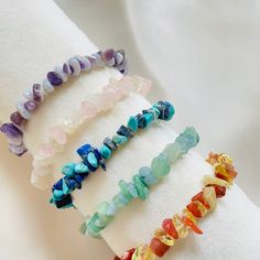 Crystal Chip Bracelet, Healing Crystal Chip Bracelet, Gemstone Chip Beads Bracelet, Chakra Crystal Healing Chip, Bracelet Gift for Women A crystal chip bracelet is a piece of jewelry made up of tiny, irregularly shaped crystals. The crystals are usually made of semiprecious stones, such as quartz or amethyst, and are cut into tiny, flat chips. Crystal chip bracelets are often worn for their decorative value and are believed by some to have healing or spiritual properties. They may be worn alone Cristal Bracelet, Crystal Chip Bracelet, Shaped Crystals, Chip Bracelet, Chakra Healing Crystals, Crystal Healing Bracelets, Bracelet Gemstone, Chip Beads, Chakra Crystals