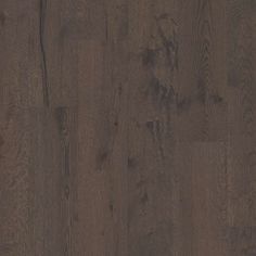 an image of wood flooring that looks like it has been painted in dark brown