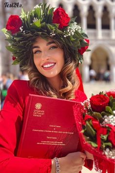 a woman wearing a wreath holding a book and flowers