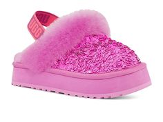 UGG Kids Funkette Chunky Sequin (Little Kid/Big Kid) - Girl's Shoes : Echinacea : Let your little one's feet shine in the warm and plushy UGG Kids Funkette Chunky Sequin slippers. Sequin upper. 10mm UGGplush 80% upcycled wool, 20% Lyocell vamp lining. 10mm cushioned sheepskin insole. Woven label with UGG logo on insole. Features an elastic strap with a UGG graphic. Soft and plushy sheepskin collar. Chunky heel. EVA outsole with satin binding. Real fur from sheep or lamb in an artificially dyed t Big Slippers, Cute Footwear, Ugg Kids, Pink Uggs, Ugg Bailey Button, Pink Flats, Slingback Flats, Kids Uggs, Ugg Slippers