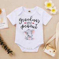 Baby Elephant Pattern Bodysuit - PrettyKid White Onesie With Character Print For Playtime, Cute White Onesie With Character Print, Cute White Onesie With Cartoon Print, Casual Printed Onesie For Playtime, Cute White Cartoon Print Onesie, White Cartoon Print Jumpsuits And Rompers For Spring, White Cartoon Print Jumpsuits For Spring, White Onesie With Cartoon Print For Playwear, White Cartoon Print Onesie For Playwear